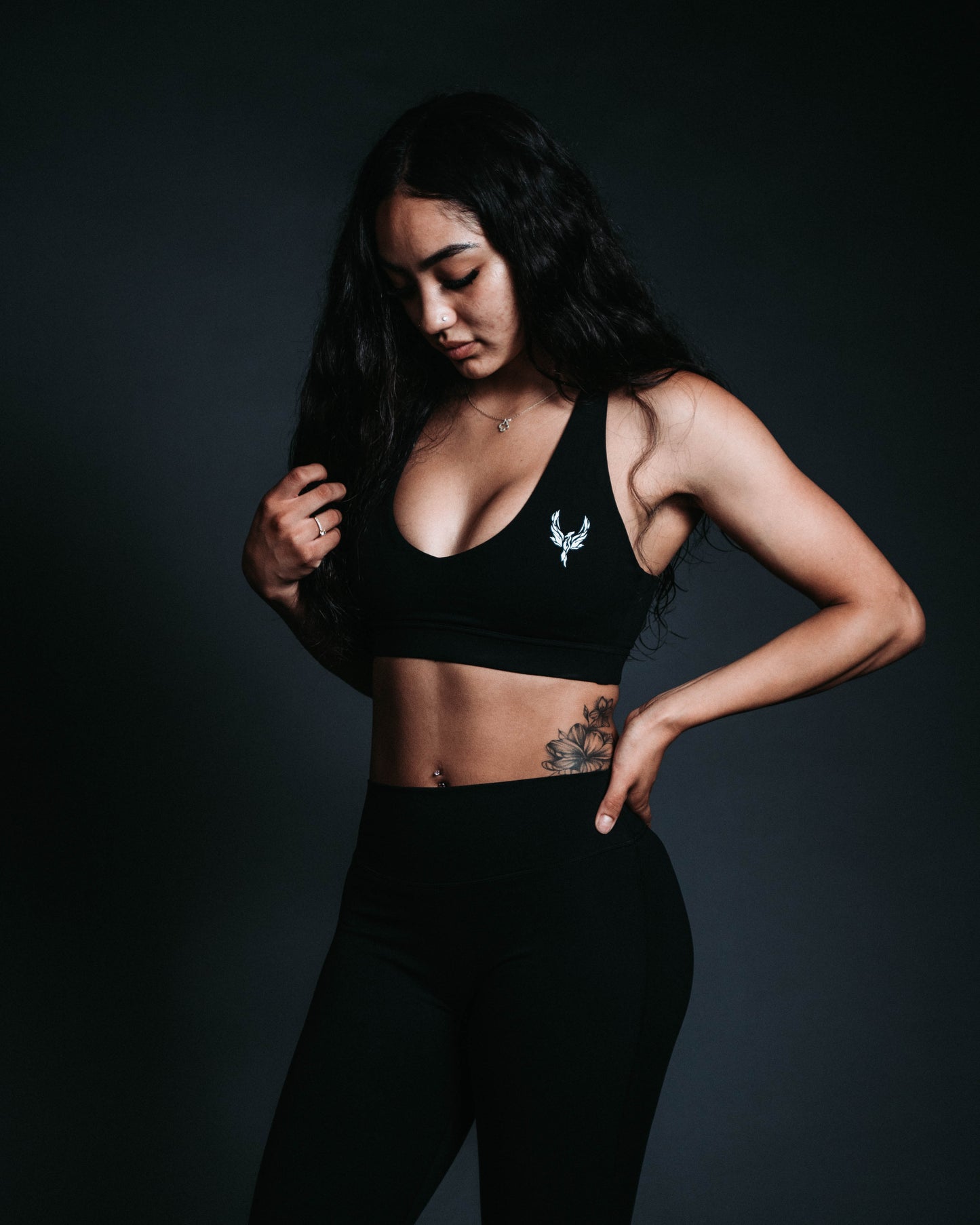Woman wearing a black sports bra