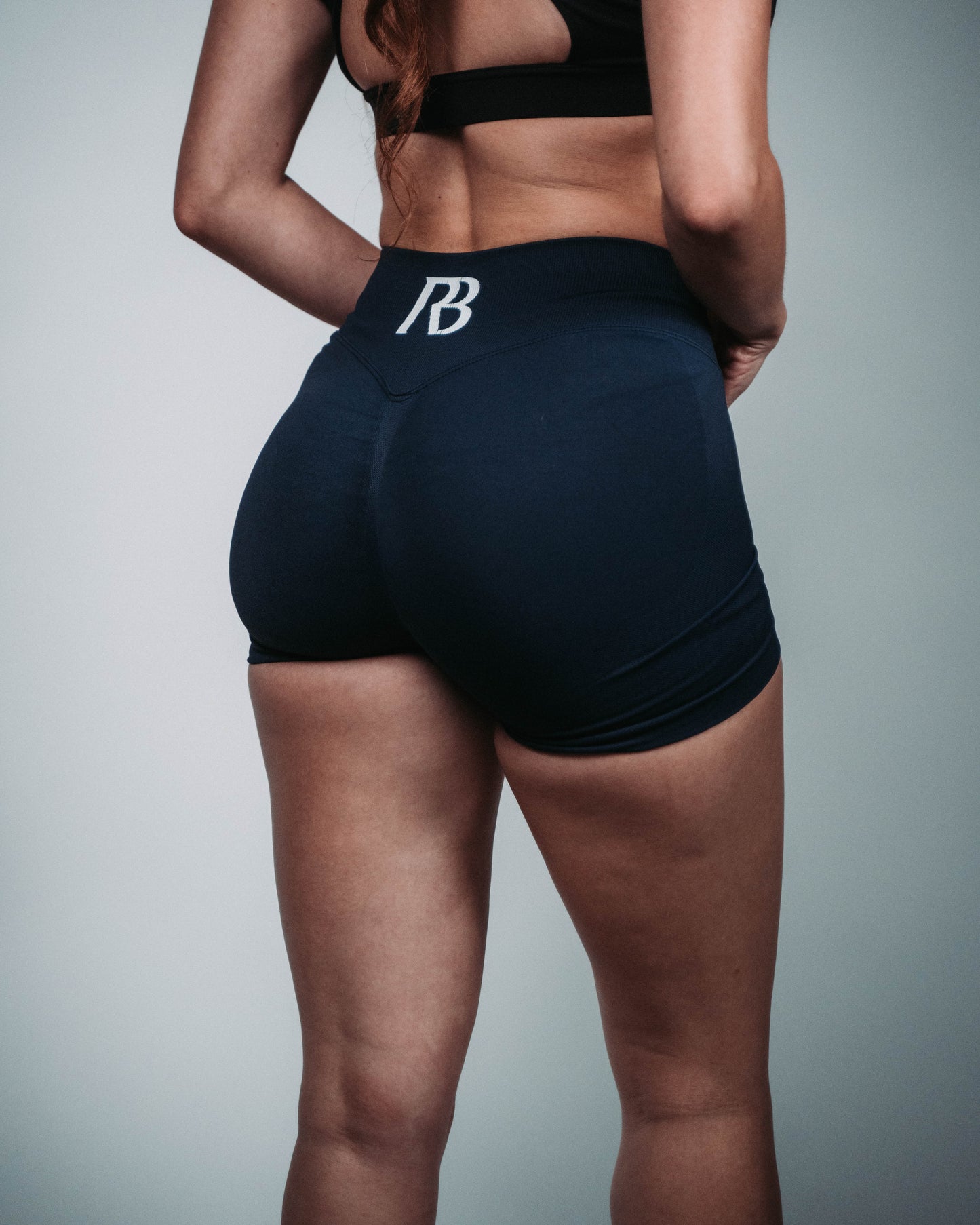 black athletic shorts with a logo